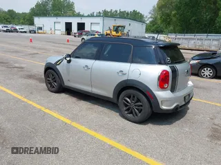 2012 MINI Countryman S z VIN WMWZC5C54CWM13119, wystawiony jako IAAI lot #42467904 z przebiegiem 115 531 mil mil oraz . Historia ofert i sprzedaży dostępna na DreamBid. Obrazek 3.