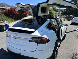 2016 Tesla Model X 70D with VIN 5YJXCDE25GF026337, listed as a IAAI auction lot 42254857 with 38,036 mi miles and . Bid and sale history available at DreamBid. Image 4.