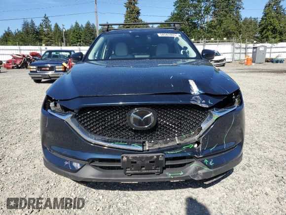 2018 Mazda CX-5 Grand Touring z VIN JM3KFBDM5J0379246, wystawiony jako Copart lot #58587865 z przebiegiem 46 339 mil mil oraz Szkody całkowita. Historia ofert i sprzedaży dostępna na DreamBid. Obrazek 5.