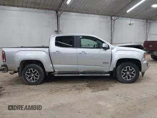 2015 GMC Canyon 4WD SLE z VIN 1GTG6BE39F1252926, wystawiony jako IAAI lot #42128396 z przebiegiem 113 139 mil mil oraz . Historia ofert i sprzedaży dostępna na DreamBid. Obrazek 13.