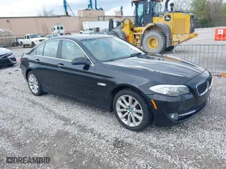 2013 BMW 5 Series 528i xDrive with VIN WBAXH5C50DD108058, listed as a IAAI auction lot 41874340 with 146,054 mi miles. Bid and sale history available at carsss.com. Image 1.