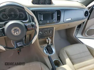 2014 Volkswagen Beetle with VIN 3VW7S7AT5EM815435, listed as a Copart auction lot 43213645 with 109,082 mi miles and Salvage Title. Bid and sale history available at DreamBid. Image 8.