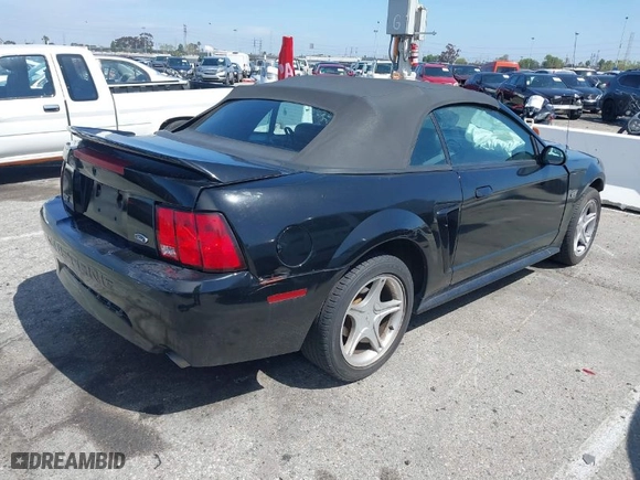 2000 Ford Mustang GT with VIN 1FAFP45X8YF266626, listed as a IAAI auction lot 41803869 with NaN miles. Bid and sale history available at carsss.com. Image 4.