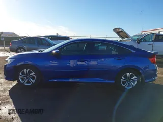 2017 Honda Civic Sedan LX with VIN 19XFC2F64HE010557, listed as a IAAI auction lot 41433110 with 111,418 mi miles. Bid and sale history available at carsss.com. Image 14.