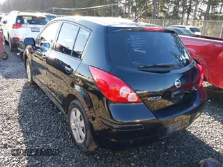 2009 Nissan Versa 1.8 SL with VIN 3N1BC13E59L406937, listed as a IAAI auction lot 41387158 with 149,234 mi miles. Bid and sale history available at carsss.com. Image 3.