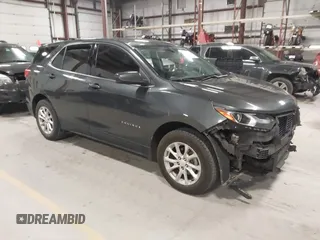 2018 Chevrolet Equinox LT z VIN 2GNAXJEV5J6286888, wystawiony jako IAAI lot #42043631 z przebiegiem 180 018 mil mil oraz . Historia ofert i sprzedaży dostępna na DreamBid. Obrazek 1.