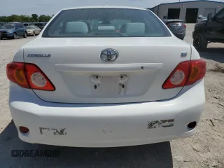2010 Toyota Corolla with VIN 2T1BU4EE2AC329301, listed as a Copart auction lot 52970705 with 197,823 mi miles and Salvage Title. Bid and sale history available at DreamBid. Image 6.