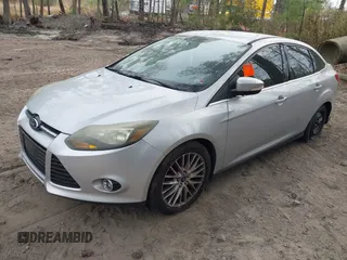 2014 Ford Focus Titanium with VIN 1FADP3J20EL148417, listed as a IAAI auction lot 41954291 with 120,098 mi miles. Bid and sale history available at carsss.com. Image 2.