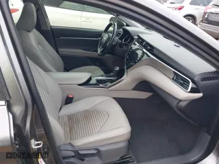 2018 Toyota Camry LE with VIN 4T1B11HK3JU630411, listed as a IAAI auction lot 41423338 with 134,959 mi miles. Bid and sale history available at carsss.com. Image 5.