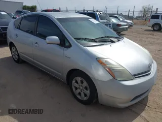 2006 Toyota Prius z VIN JTDKB20U667078185, wystawiony jako IAAI lot #42382587 z przebiegiem 245 941 mil mil oraz . Historia ofert i sprzedaży dostępna na DreamBid. Obrazek 1.