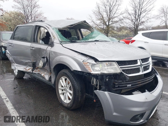 2016 Dodge Journey SXT with VIN 3C4PDDBG7GT173158, listed as a IAAI auction lot 42020182 with 159,136 mi miles. Bid and sale history available at carsss.com. Image 1.