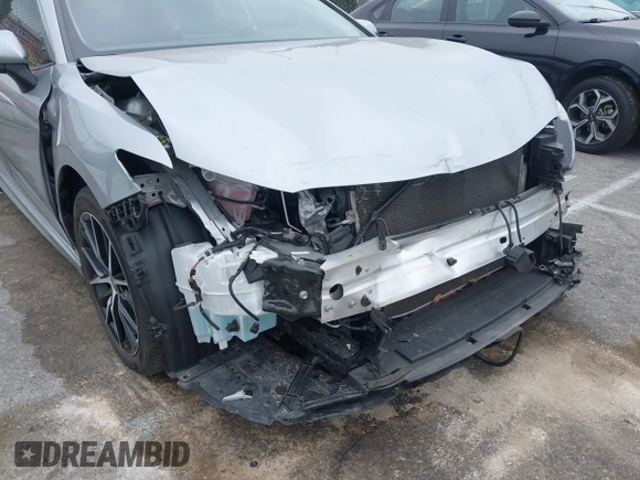 2023 Toyota Camry SE with VIN 4T1G11AKXPU809876, listed as a IAAI auction lot 42100546 with 35,055 mi miles and . Bid and sale history available at DreamBid. Image 6.