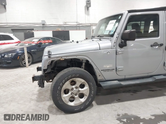2014 Jeep Wrangler Unlimited Sahara with VIN 1C4BJWEG5EL164350, listed as a IAAI auction lot 42018586 with 113,222 mi miles. Bid and sale history available at carsss.com. Image 6.