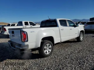 2015 GMC Canyon 4WD SLE with VIN 1GTG6BE32F1185781, listed as a Copart auction lot 79688404 with 199,781 mi miles and Salvage Title. Bid and sale history available at carsss.com. Image 3.