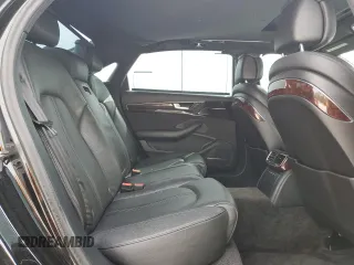 2014 Audi A8 3.0T z VIN WAURGAFD2EN002567, wystawiony jako Copart lot #48188395 z przebiegiem 159 477 mil mil oraz Szkody całkowita. Historia ofert i sprzedaży dostępna na DreamBid. Obrazek 10.