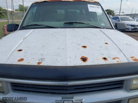 1997 Chevrolet Tahoe with VIN 1GNEK13R3VJ416827, listed as a IAAI auction lot 42041780 with 143,566 mi miles. Bid and sale history available at carsss.com. Image 6.