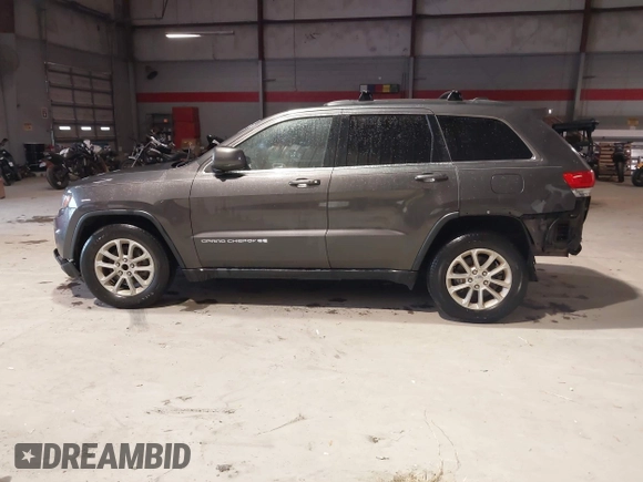2014 Jeep Grand Cherokee Laredo with VIN 1C4RJEAG7EC145023, listed as a IAAI auction lot 40518825 with 115,098 mi miles and . Bid and sale history available at DreamBid. Image 14.