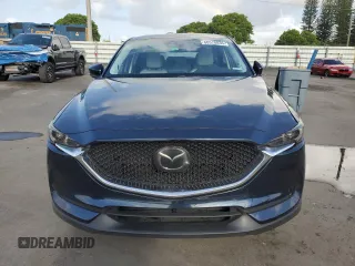 2018 Mazda CX-5 Grand Touring with VIN JM3KFADMXJ1353942, listed as a Copart auction lot 60570835 with 74,400 mi miles and Clean title. Bid and sale history available at DreamBid. Image 5.