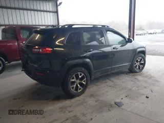2014 Jeep Cherokee Trailhawk with VIN 1C4PJMBS3EW150366, listed as a IAAI auction lot 41971035 with 90,994 mi miles. Bid and sale history available at carsss.com. Image 4.