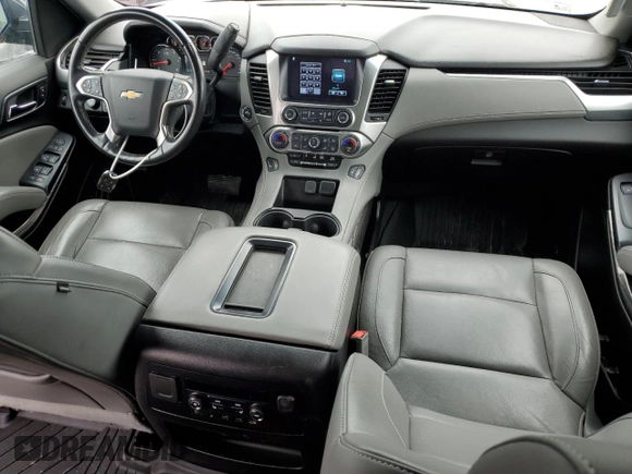 2019 Chevrolet Tahoe LT with VIN 1GNSKBKCXKR212450, listed as a Copart auction lot 54433205 with 119,907 mi miles and Salvage title. Bid and sale history available at DreamBid. Image 8.