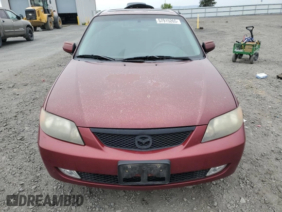 2002 Mazda Protege DX z VIN JM1BJ225320636991, wystawiony jako Copart lot #57915265 z przebiegiem 123 371 mil mil oraz Szkoda całkowita • Salvage title. Historia ofert i sprzedaży dostępna na DreamBid. Obrazek 5.