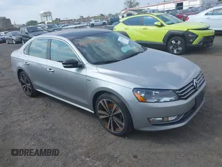 2014 Volkswagen Passat SE with VIN 1VWBT7A35EC108635, listed as a IAAI auction lot 42795905 with 212,711 mi miles and . Bid and sale history available at DreamBid. Image 1.