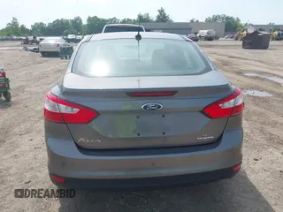 2013 Ford Focus SE with VIN 1FADP3F23DL242475, listed as a IAAI auction lot 42549898 with 155,646 mi miles and . Bid and sale history available at DreamBid. Image 16.