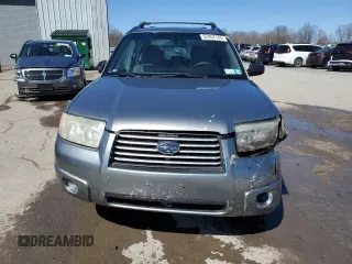 2007 Subaru Forester X with VIN JF1SG63697H708529, listed as a Copart auction lot 52957765 with 191,942 mi miles and Salvage Title. Bid and sale history available at carsss.com. Image 5.