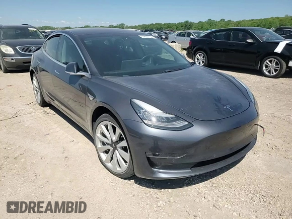 2018 Tesla Model 3 Long Range Battery z VIN 5YJ3E1EB4JF116531, wystawiony jako Copart lot #55609755 z przebiegiem 63 695 mil mil oraz Szkody całkowita. Historia ofert i sprzedaży dostępna na DreamBid. Obrazek 13.