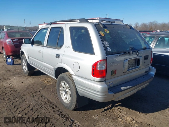 2002 Isuzu Rodeo z VIN 4S2DM58W524317574, wystawiony jako IAAI lot #41604546 z przebiegiem 150 000 mil mil oraz . Historia ofert i sprzedaży dostępna na DreamBid. Obrazek 3.