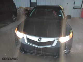 2009 Acura TSX with VIN JH4CU26629C004182, listed as a IAAI auction lot 42086811 with 206,526 mi miles. Bid and sale history available at carsss.com. Image 6.