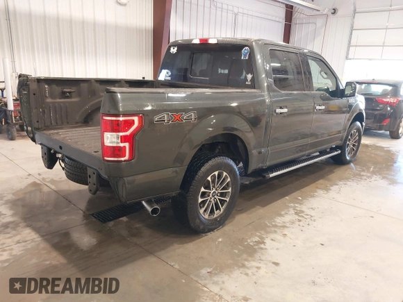 2018 Ford F-150 XL with VIN 1FTEW1EG3JKE52823, listed as a IAAI auction lot 41413009 with 142,057 mi miles. Bid and sale history available at carsss.com. Image 4.