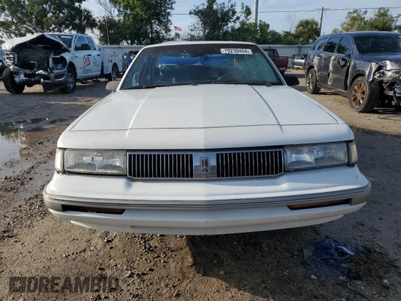 1996 Oldsmobile Cutlass Ciera 1SA VX5 z VIN 1G3AJ55M5T6394526, wystawiony jako Copart lot #72783674 z przebiegiem 77 988 mil mil oraz Szkoda całkowita • Salvage title. Historia ofert i sprzedaży dostępna na DreamBid. Obrazek 5.