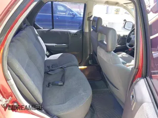 1999 Isuzu Rodeo S z VIN 4S2CK58WXX4346156, wystawiony jako IAAI lot #42328951 z przebiegiem 196 182 mil mil oraz . Historia ofert i sprzedaży dostępna na DreamBid. Obrazek 8.