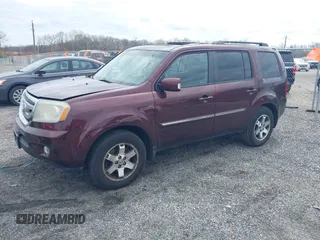2010 Honda Pilot Touring with VIN 5FNYF4H95AB040721, listed as a IAAI auction lot 41928412 with 213,219 mi miles and . Bid and sale history available at carsss.com. Image 17.