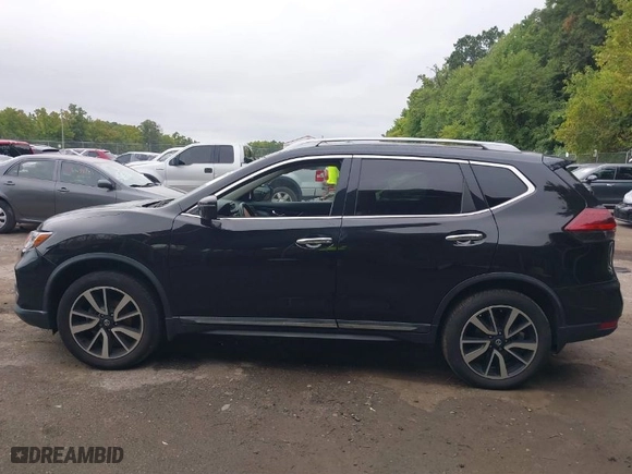2019 Nissan Rogue S with VIN 5N1AT2MV0KC797750, listed as a IAAI auction lot 40239938 with 71,268 mi miles. Bid and sale history available at carsss.com. Image 14.