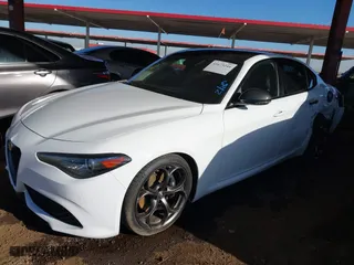 2018 Alfa Romeo Giulia Ti with VIN ZARFAECN3J7597798, listed as a IAAI auction lot 41675244 with 86,306 mi miles. Bid and sale history available at carsss.com. Image 2.