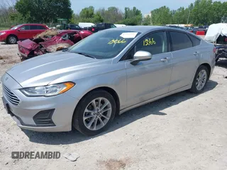 2020 Ford Fusion SE z VIN 3FA6P0HD6LR144501, wystawiony jako IAAI lot #42715066 z przebiegiem 204 983 mil mil oraz . Historia ofert i sprzedaży dostępna na DreamBid. Obrazek 17.