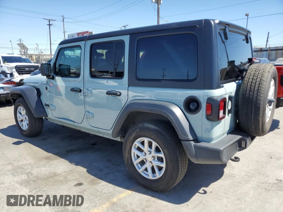 2023 Jeep Wrangler Sport S with VIN 1C4HJXDG5PW623797, listed as a Copart auction lot 66359625 with 16,518 mi miles and Salvage title. Bid and sale history available at DreamBid. Image 2.