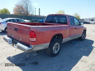 1999 Dodge Dakota SLT z VIN 1B7GL22X2XS222162, wystawiony jako IAAI lot #42038943 z przebiegiem 222 883 mil mil oraz . Historia ofert i sprzedaży dostępna na DreamBid. Obrazek 4.