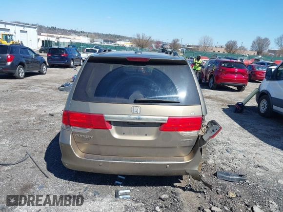 2010 Honda Odyssey Touring with VIN 5FNRL3H9XAB094765, listed as a IAAI auction lot 41892743 with 127,143 mi miles. Bid and sale history available at carsss.com. Image 16.