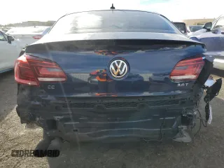 2014 Volkswagen CC R-Line with VIN WVWBP7AN7EE506748, listed as a Copart auction lot 84244724 with 99,272 mi miles and Salvage Title. Bid and sale history available at carsss.com. Image 6.