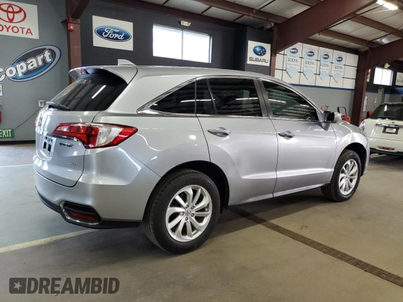 2018 Acura RDX with VIN 5J8TB4H34JL011372, listed as a Copart auction lot 54476865 with 156,917 mi miles and Salvage Title. Bid and sale history available at DreamBid. Image 3.