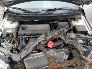 2010 Kia Forte EX z VIN KNAFU4A28A5109118, wystawiony jako Copart lot #56460755 z przebiegiem 143 845 mil mil oraz Szkoda całkowita • Salvage title. Historia ofert i sprzedaży dostępna na DreamBid. Obrazek 11.