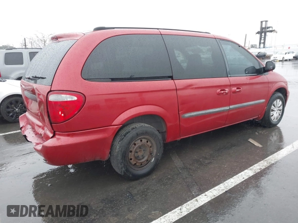 2003 Dodge Grand Caravan with VIN 2D4GP44353R229521, listed as a IAAI auction lot 41797486 with 213,342 mi miles and . Bid and sale history available at DreamBid. Image 4.