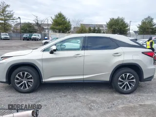2021 Lexus RX with VIN 2T2HZMDA4MC260038, listed as a IAAI auction lot 41737513 with 45,252 mi miles. Bid and sale history available at carsss.com. Image 14.