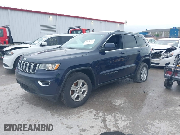 2017 Jeep Grand Cherokee Laredo with VIN 1C4RJFAGXHC912454, listed as a IAAI auction lot 42140735 with 138,895 mi miles and . Bid and sale history available at DreamBid. Image 2.