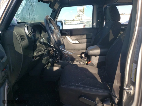 2016 Jeep Wrangler Unlimited 75th Anniversary with VIN 1C4BJWEG7GL255610, listed as a Copart auction lot 88994185 with 75,131 mi miles and Salvage Title. Bid and sale history available at carsss.com. Image 7.