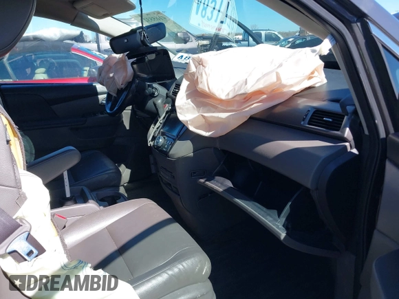 2016 Honda Odyssey Touring Elite with VIN 5FNRL5H97GB010275, listed as a IAAI auction lot 41655328 with Not Provided miles. Bid and sale history available at carsss.com. Image 5.