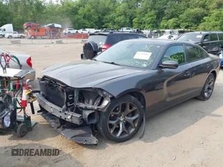 2015 Dodge Charger SXT with VIN 2C3CDXHGXFH897395, listed as a IAAI auction lot 42383907 with 145,334 mi miles and . Bid and sale history available at DreamBid. Image 17.